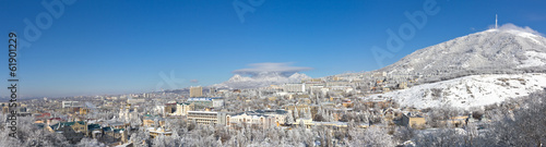 City panorama against mountains. © nikolay53