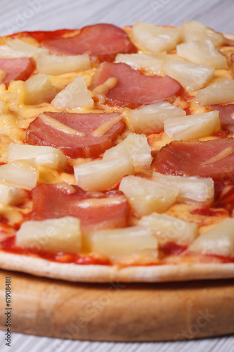 Hawaiian pizza close up. Vertical