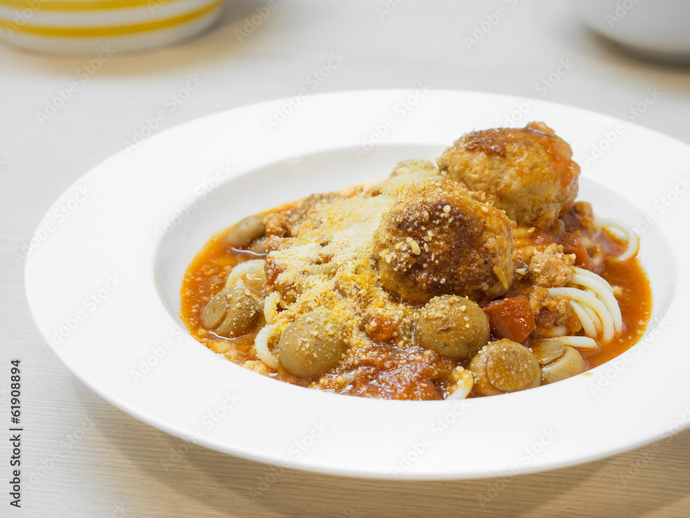 spaghetti and meatball on the white plate. spaghetti and meatball on the white plate.