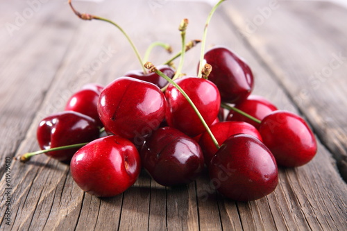Ripe of cherry on a wooden table