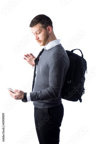 student looking surprised at smartphone