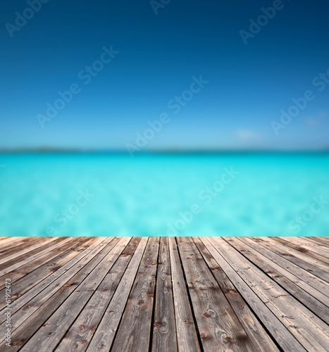 wooden floor and blue sea