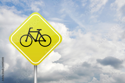 Yellow road warning sign with bicycle