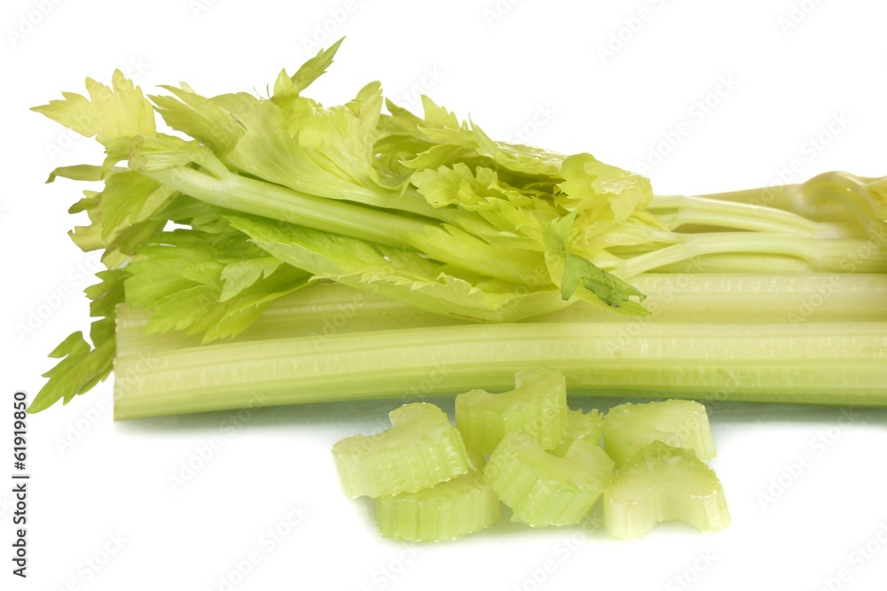 fresh slised green celery isolated on white. fresh slised green celery isolated on white.