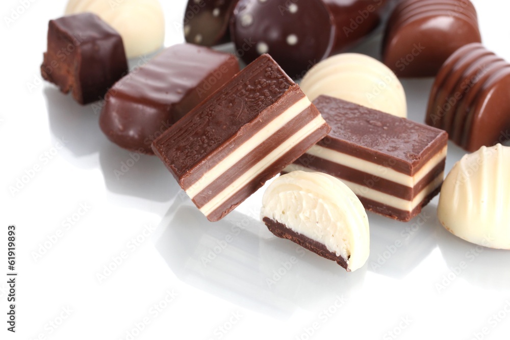 Many different chocolate candy isolated on white Many different chocolate candy isolated on white