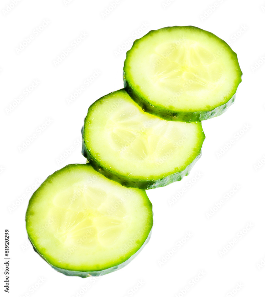 Sliced fresh cucumber, isolated on white Sliced fresh cucumber, isolated on white