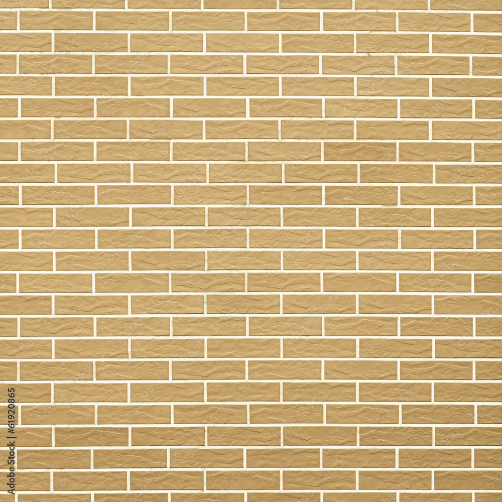Closeup of yellow brick wall as background or texture Closeup of yellow brick wall as background or texture