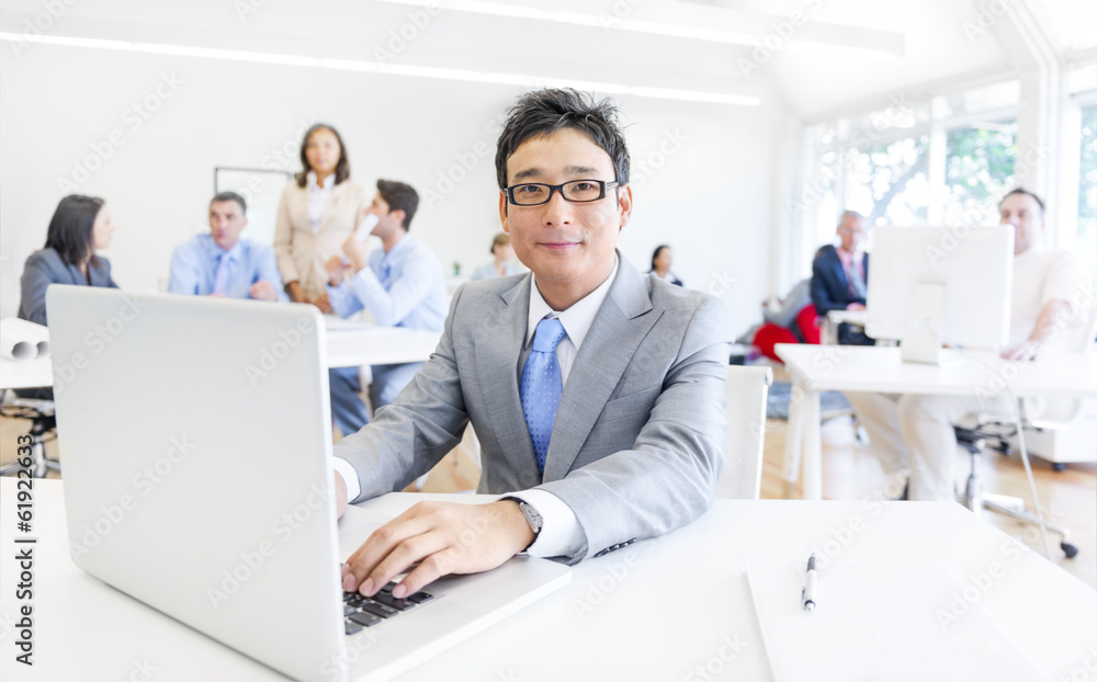 Business Man Working in the Office with the Team Business Man Working in the Office with the Team