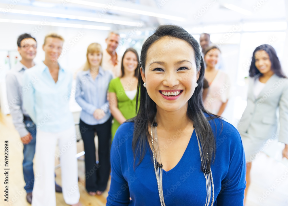 Beautiful Woman with Colleagues in the Office Beautiful Woman with Colleagues in the Office