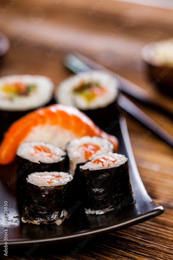 Decorative composition with sushi, Japanese seafood Decorative composition with sushi, Japanese seafood