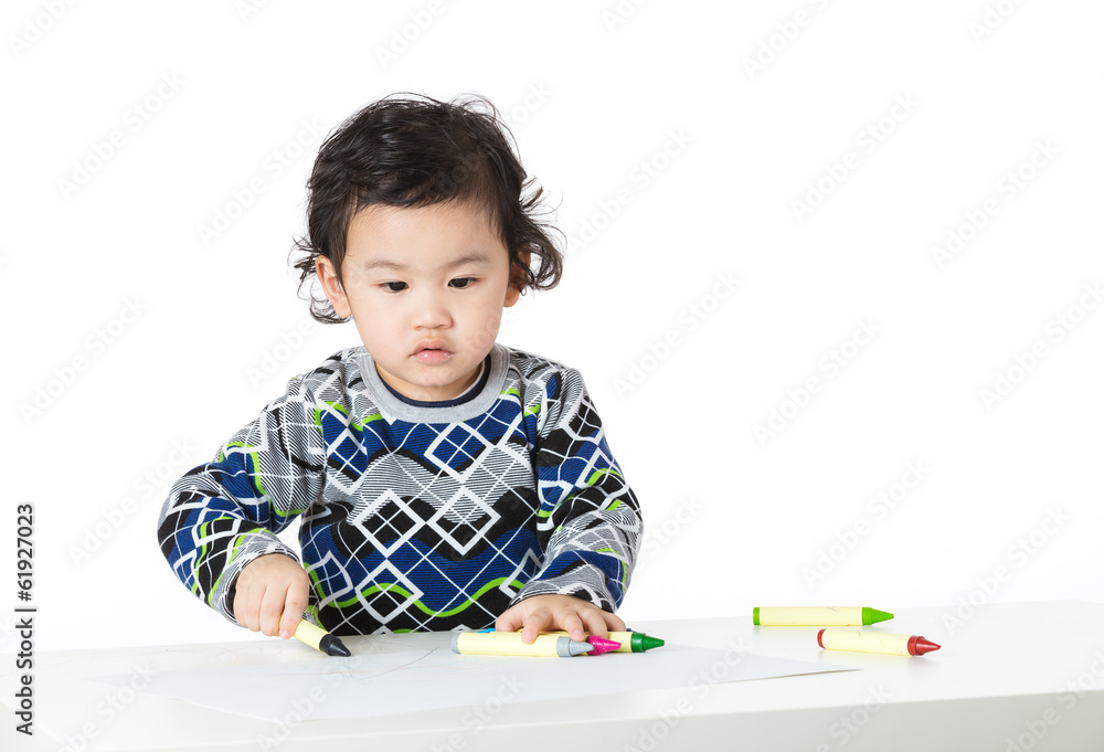 Asian baby boy concentrate on drawing Asian baby boy concentrate on drawing