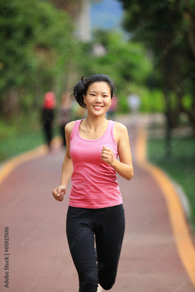 woman running at trail woman running at trail