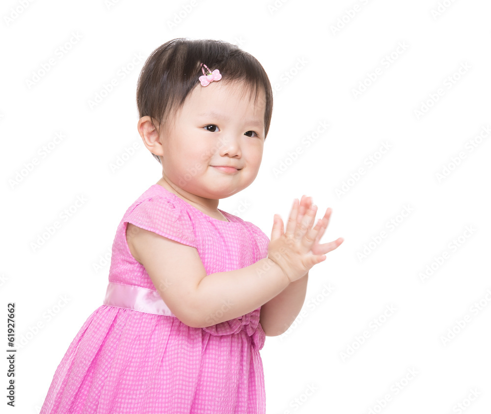 Asian baby girl clapping hand