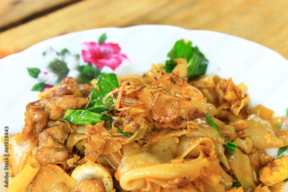 Closeup fired thin noodles with soy sauce, thai style food