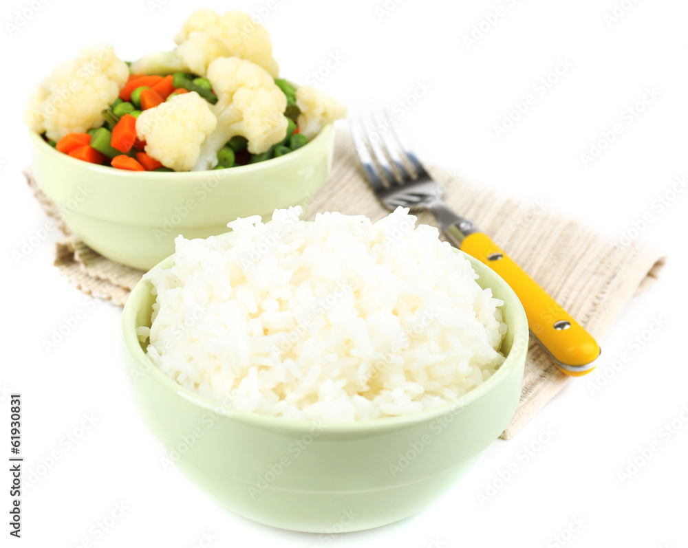 Cooked rice and vegetables isolated on white Cooked rice and vegetables isolated on white