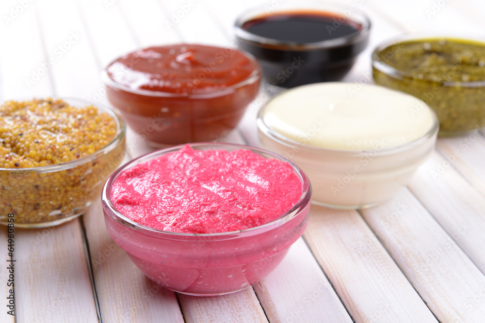 Various sauces on table close-up Various sauces on table close-up