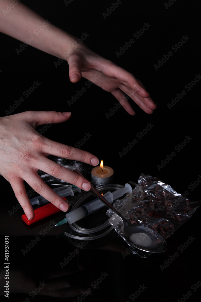 Drug addict with syringe on black background Drug addict with syringe on black background