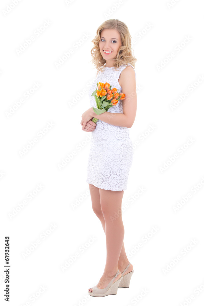 smiling woman with orange tulips isolated on white smiling woman with orange tulips isolated on white
