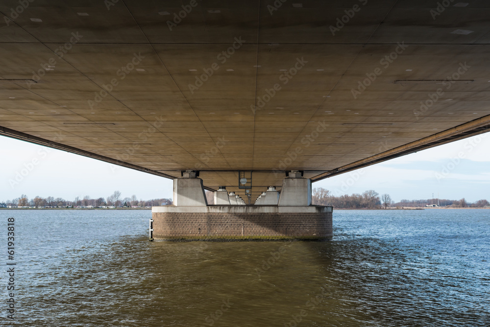 Underside of a long bridge in the Netherlands