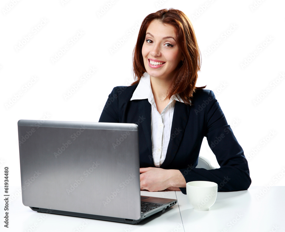 businesswoman sitting on the table with laptop businesswoman sitting on the table with laptop