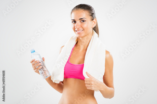 Fitness young woman resting after exercising. © milanmarkovic78