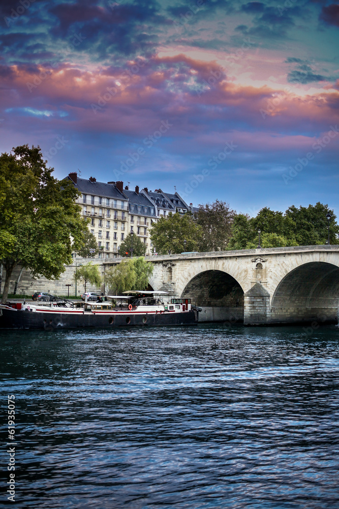 Paris, view of the Seine and the boat,  beautiful sunset sky