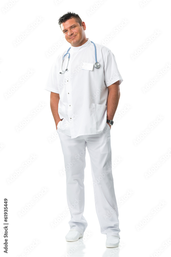 Handsome doctor in a white dress stands on white background Handsome doctor in a white dress stands on white background