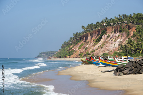 Tropical beach with fishing boats