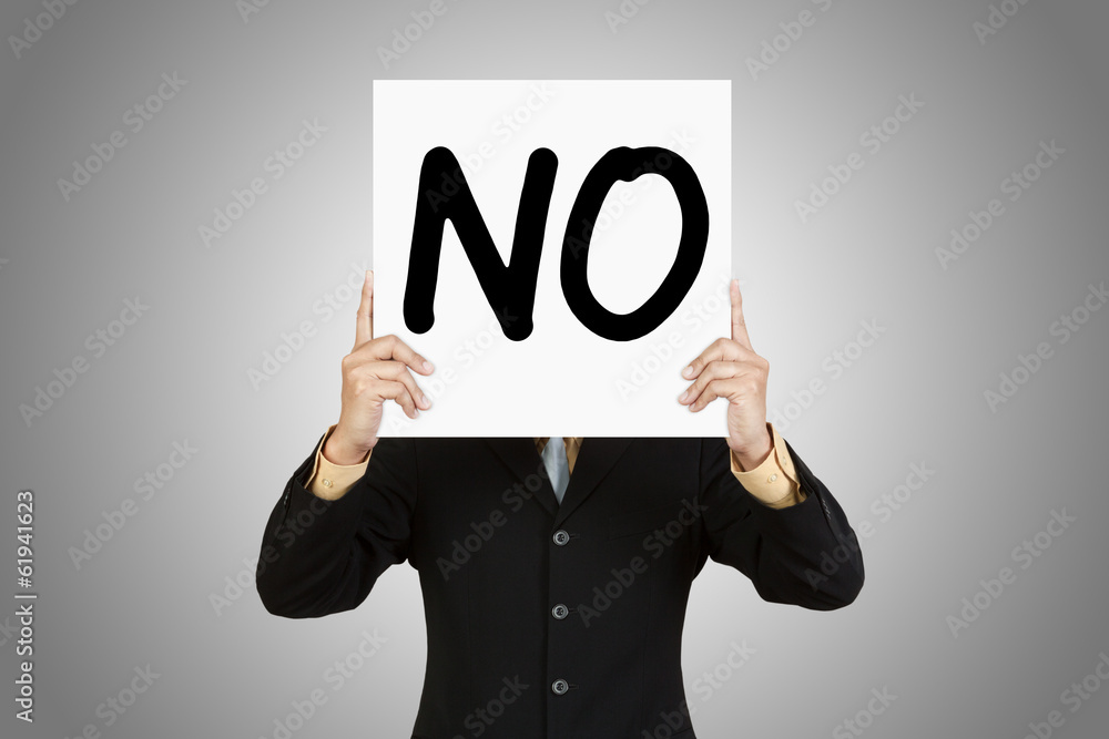 Businessman show wording No on paper board Businessman show wording No on paper board