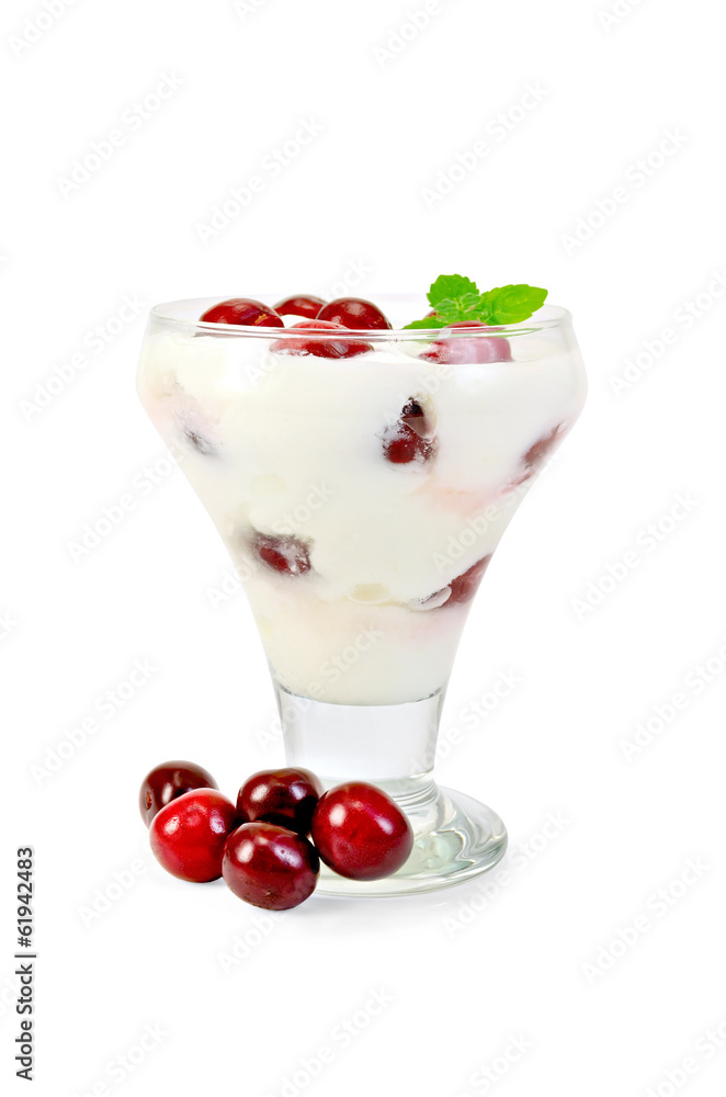 Yogurt thick with cherry in glass sundae dish Yogurt thick with cherry in glass sundae dish