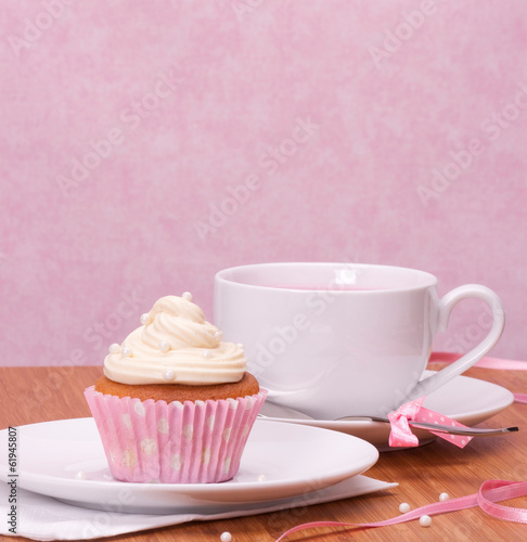 Cupcake And Fruit Tea Cup On Wooden Background