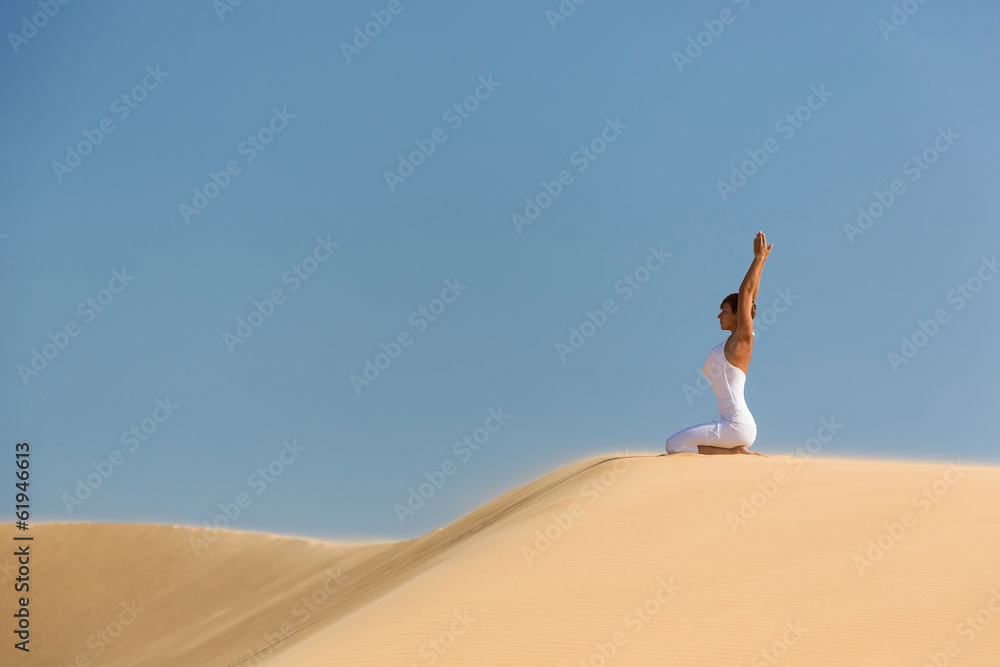 Yoga meditation on the beach, healthy female body in peace Yoga meditation on the beach, healthy female body in peace