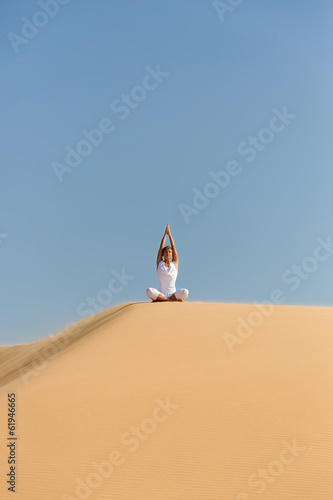 Yoga meditation on the beach, healthy female body in peace