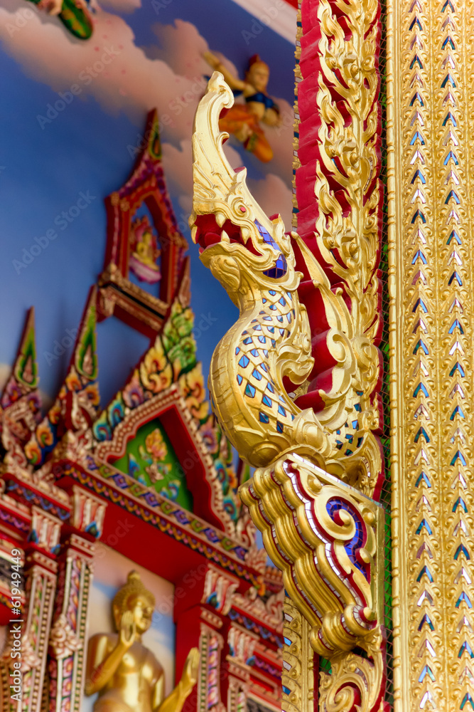 Thai art golden of head king of nagas in Buddhist temple.