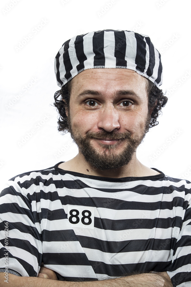 Illegal, Desperate, portrait of a man prisoner in prison garb, o Illegal, Desperate, portrait of a man prisoner in prison garb, o