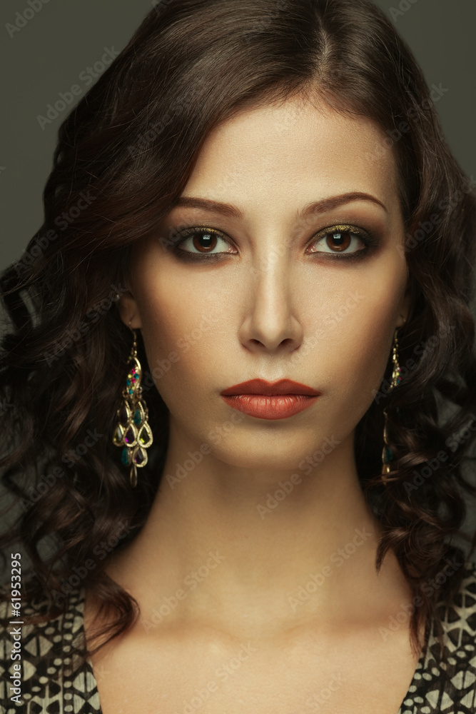 Emotive portrait of a fashionable model with curly hair Emotive portrait of a fashionable model with curly hair