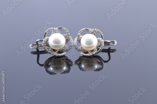 Set of silver earrings and a ring