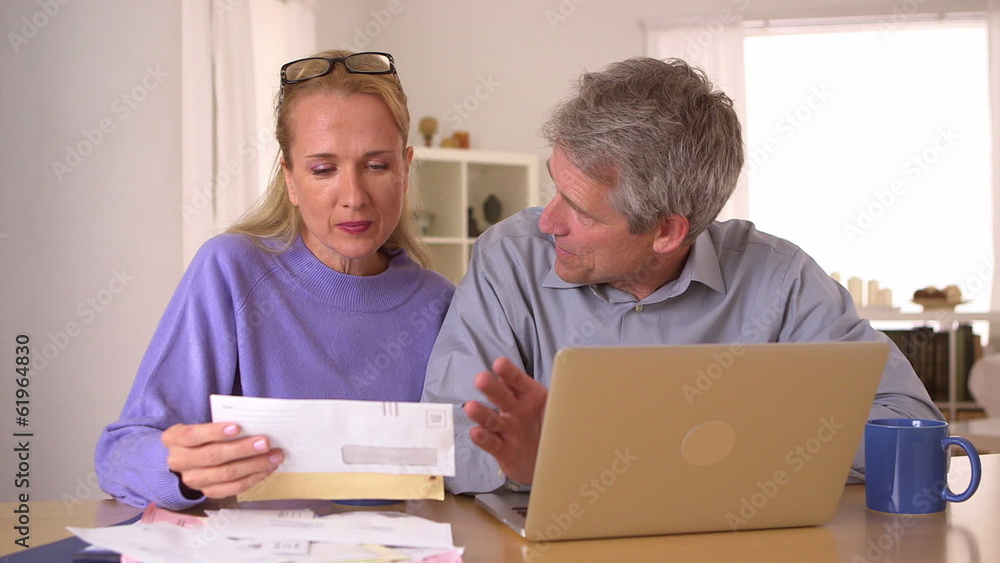 Mature couple having trouble with bills Mature couple having trouble with bills