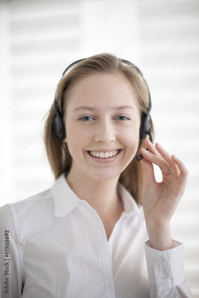 portrait of a beautiful young woman with headphones