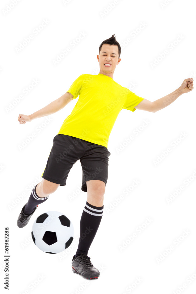 Soccer player kicking ball