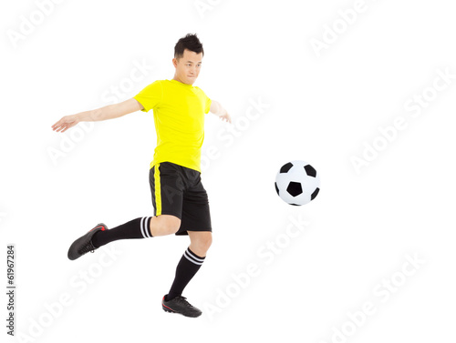 Soccer Player Kicking Ball © Tom Wang