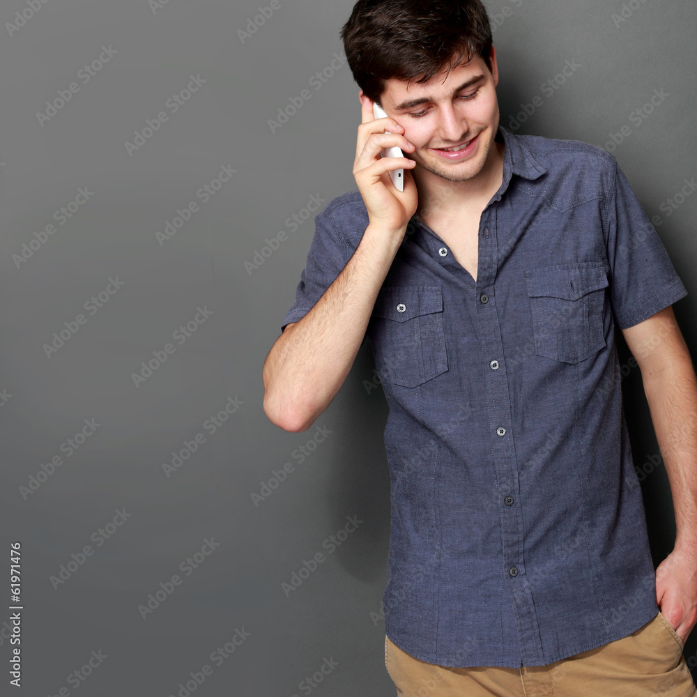young man calling by phone young man calling by phone