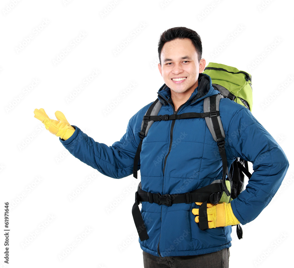 male hiker with backpack presenting male hiker with backpack presenting