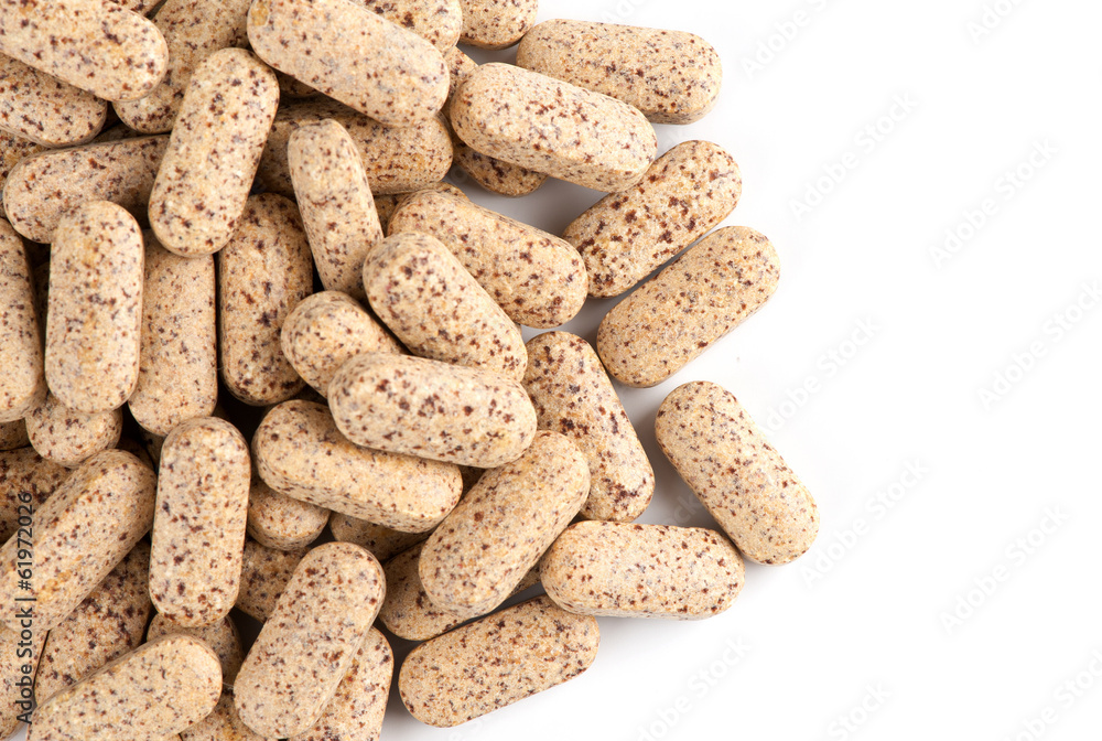 dietary supplement. multivitamin tablets on white dietary supplement. multivitamin tablets on white