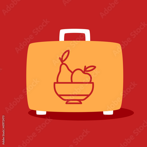 suitcase with a fruit plate.