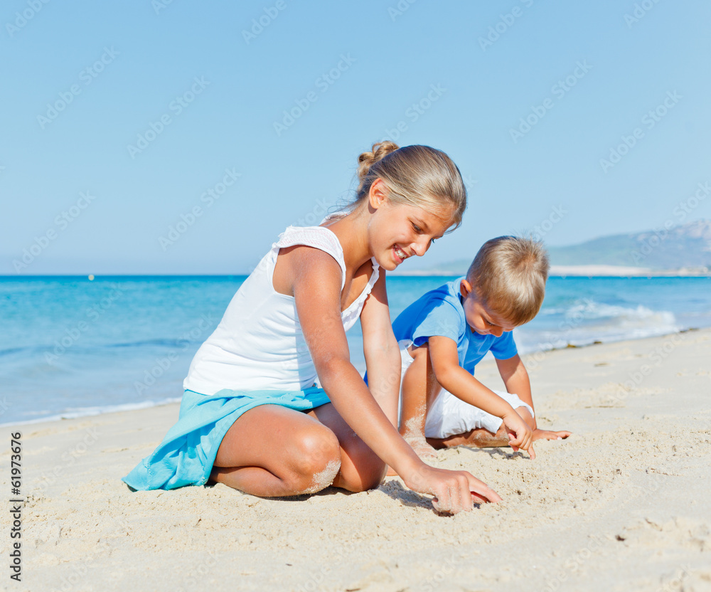 Family having fun on beach