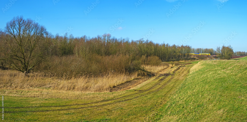 Train riding through the countryside in winter Train riding through the countryside in winter