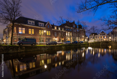 Tranquil evening by the canal in the old city of Delft, The Neth