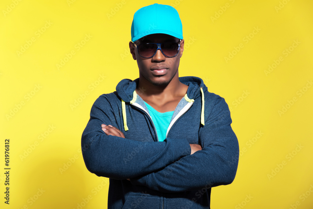 Athletic runner with sunglasses wearing blue sportswear fashion. Athletic runner with sunglasses wearing blue sportswear fashion.