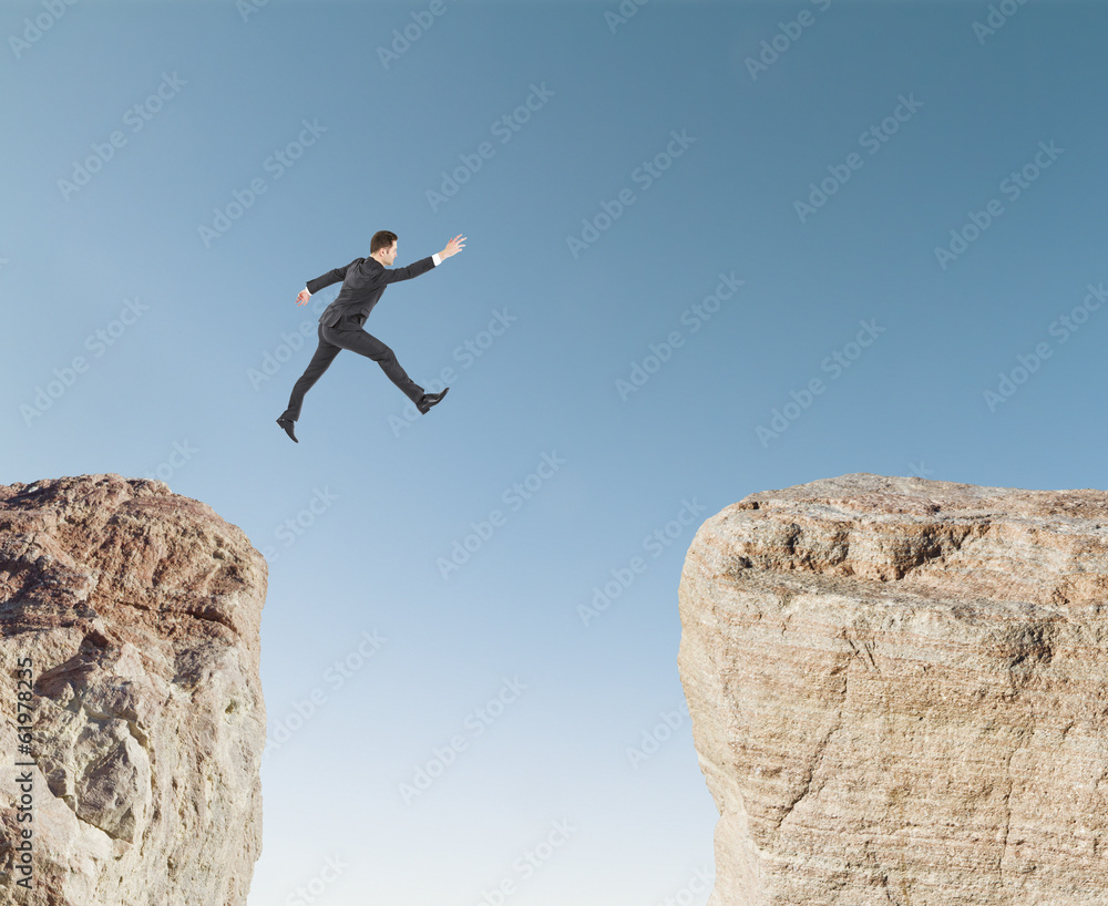 Businessman jumping